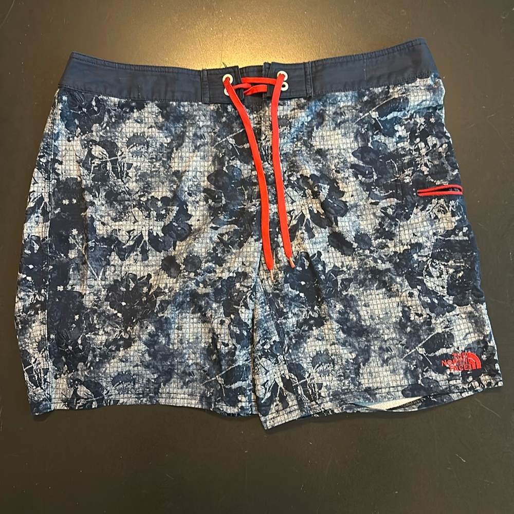 Northface, blue and red detailed board shorts